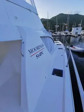 2017 Leopard 51 Powercat moored at a marina with surrounding boats.