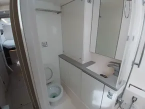 Modern bathroom in a 2019 Leopard 45 yacht, featuring sleek cabinetry and fixtures.