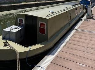 narrowboat with residential mooring