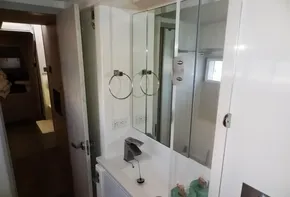 2017 Leopard 43 Powercat bathroom with modern sink, mirror, and storage.