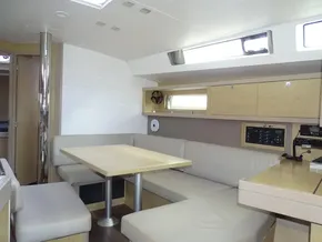 Interior of 2017 Beneteau Oceanis 45 yacht with modern seating and dining area.