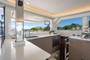 Luxurious kitchen interior on a 2022 Leopard 50 yacht, featuring modern design and scenic views.