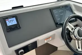 2025 Robertson and Caine Leopard 46 Powercat helm with Raymarine navigation display.