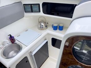 Galley area, with hob and fridge