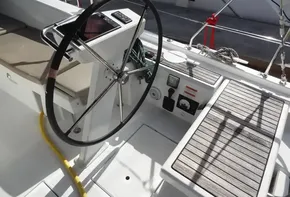 Steering wheel and cockpit of 2020 Beneteau Oceanis 46.1 sailboat.