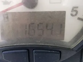 Close-up of a dusty gauge displaying 1659.1 hours on a 2020 Lagoon 42.