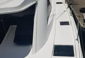 2017 Leopard 48 yacht docked at a marina, showcasing its sleek deck design.