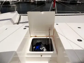 Open storage compartment on 2021 Leopard 40 catamaran deck, containing snorkeling gear.