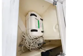 Storage compartment on 2019 Leopard 50 boat with rope and equipment.