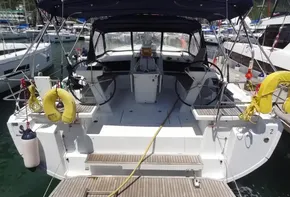 Beneteau Oceanis 46.1 2020 model yacht docked at marina, rear view of cockpit.