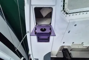 Leopard 45 yacht deck with open hatch and interior view, 2020 model.