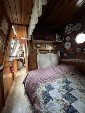 Double bed area. Cosy and door at either end. 