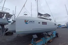 2024 Lagoon 42 catamaran on land, featuring 