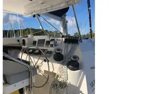Helm station of 2020 Leopard 40 catamaran with steering wheel and navigation equipment.