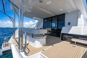 2025 Leopard 40 Powercat yacht deck with seating, ocean view, and modern design.