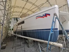 2015 Leopard 51 Powercat under maintenance in a covered dry dock.