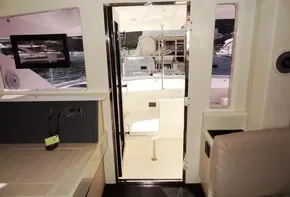 Interior view of 2015 Leopard 51 Powercat yacht with open door to deck.