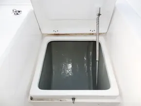 Open storage compartment on a 2018 Leopard 43 Powercat boat.