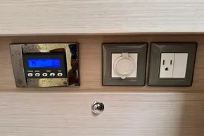 Control panel and outlets on 2023 Beneteau Oceanis 51.1 yacht interior.