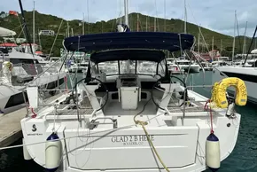 Beneteau Oceanis 51.1 yacht, 2023 model, docked in a marina with scenic background.