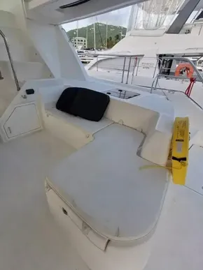 2017 Leopard 51 Powercat yacht with cushioned seating area on deck.