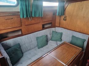 Lounge with table that converts