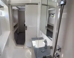 Modern bathroom interior of 2020 Leopard 50 yacht with sleek fixtures and ample storage.