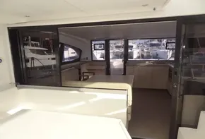 Interior view of 2017 Leopard 43 Powercat yacht with spacious seating area.