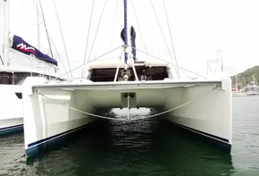 Leopard 50 catamaran, 2020 model, docked in marina, front view.