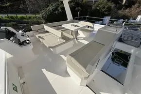 2024 Leopard 40 Powercat yacht deck with seating and table, showcasing modern design.