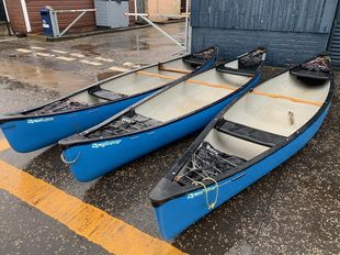 Used Symphony canoes with buoyancy blocks