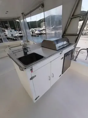 Outdoor kitchen area on a 2017 Leopard 51 Powercat yacht.