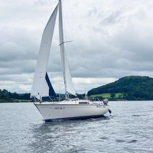 Sailing cruiser Jaguar 21 with road trailer