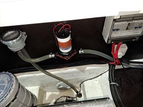 Deckwash inlet, filter, and pump