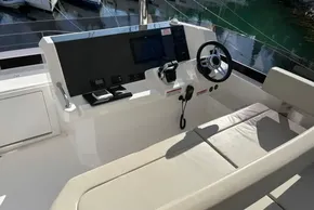 2024 Leopard 40 Powercat helm with modern controls and comfortable seating.