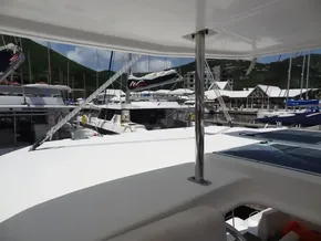 Leopard 40 catamaran docked at marina, surrounded by other boats, 2021 model.