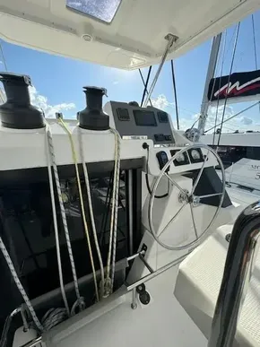 2020 Leopard 50 yacht helm with steering wheel and navigation controls.