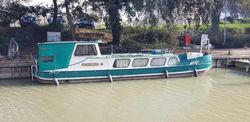 Liveaboard 12m barge with mooring in France