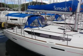 2017 Jeanneau Sun Odyssey 389 sailboat docked in marina.