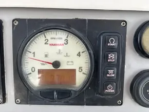 Control panel of a 2019 Leopard 40 with Yanmar RPM gauge and buttons.