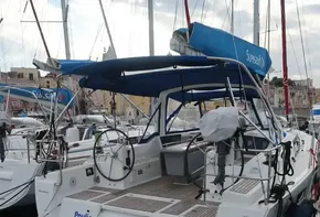2019 Beneteau Oceanis 41.1 sailboat docked in marina, rear view.