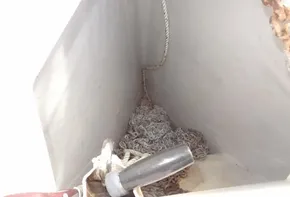 Anchor chain locker of 2017 Jeanneau Sun Odyssey 389 sailboat.