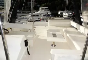 2017 Leopard 43 Powercat yacht interior with spacious seating and marina view.