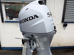 NEW HONDA BF50LRTU OUTBOARD ENGINE. SOME DAMAGE
