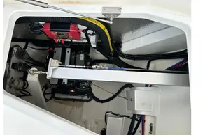 Engine compartment of a 2021 Leopard 50 yacht, showcasing mechanical components and wiring.