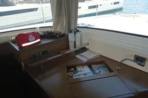 Interior of 2020 Lagoon 46 yacht with navigation tools and safety equipment.