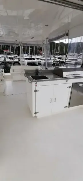 Spacious deck area of a 2019 Leopard 51 Powercat yacht with modern amenities.