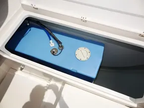 Blue water tank in 2017 Leopard 43 Powercat storage compartment.