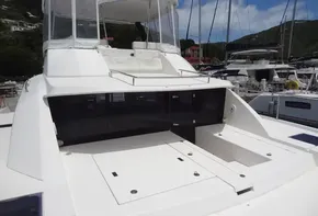 2020 Leopard 43 Powercat yacht docked at marina, rear view.