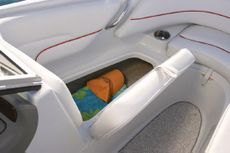 Crownline Bowrider 190 LS Spacious storage area under the bow bench seat is easily accessed with lift strap.